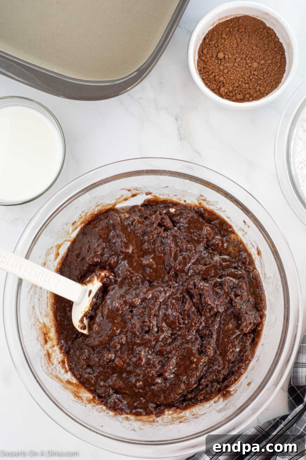 Eggs and vanilla added to mixing bowl. 