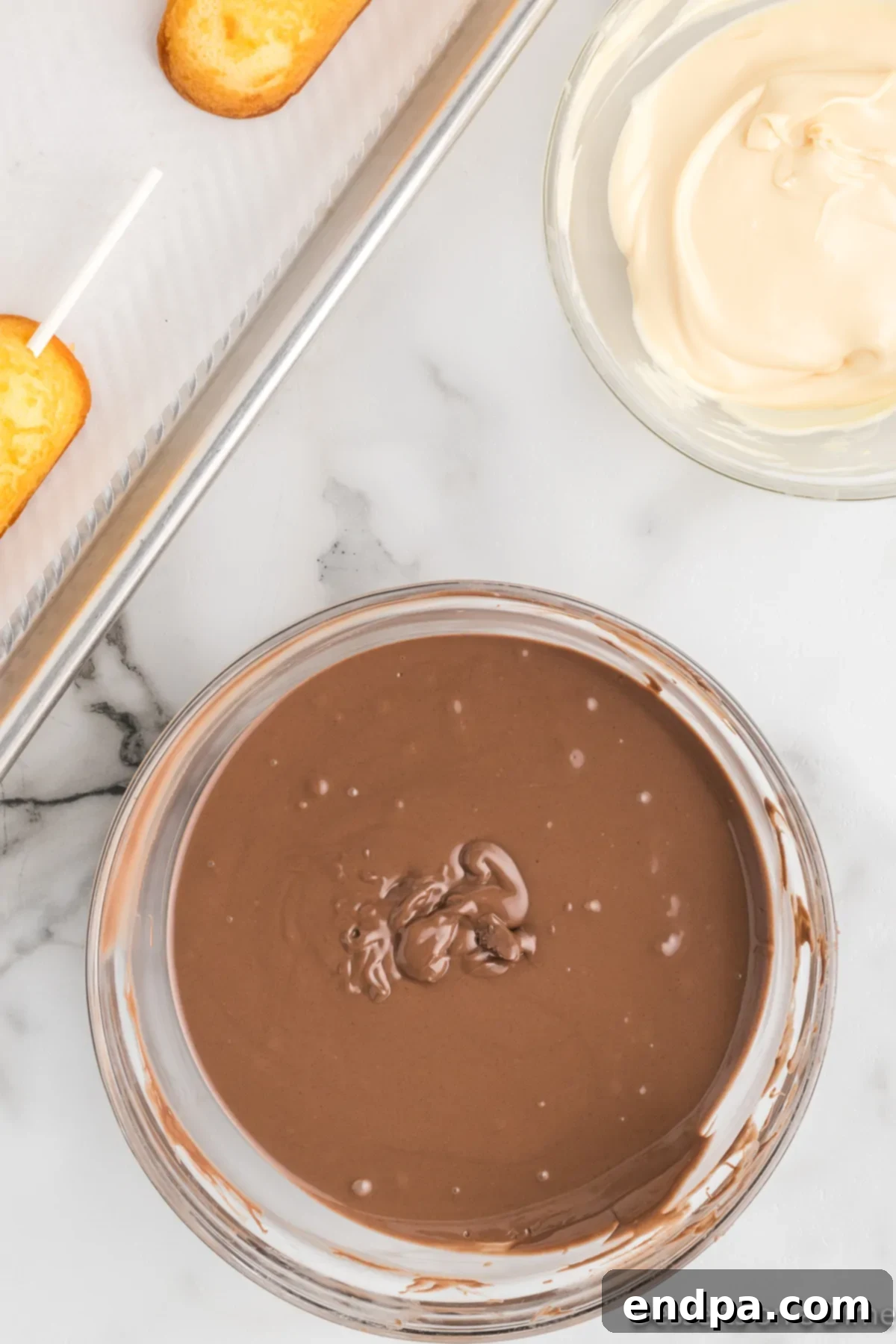 Decadent Chocolate Dipped Twinkies 5 A bowl of rich, smooth melted chocolate, ready for dipping.