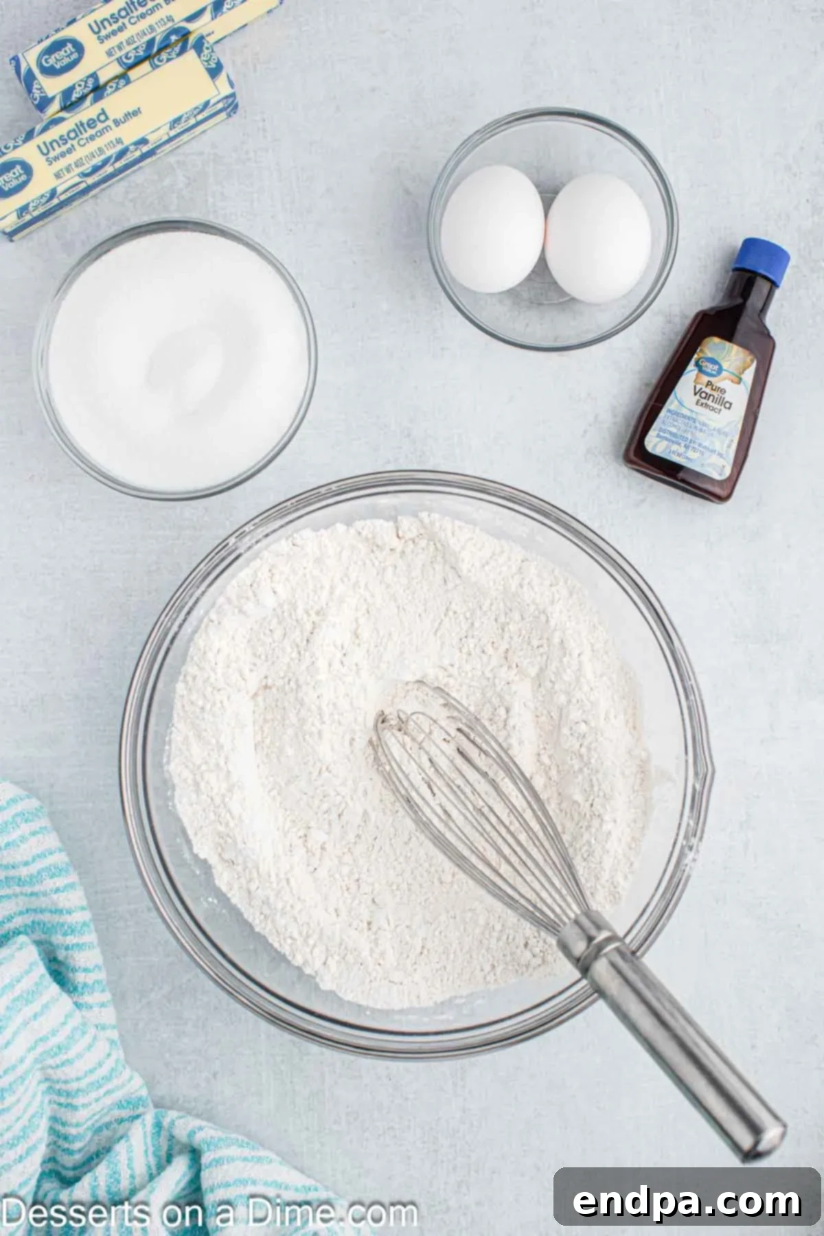 Enchanted Unicorn Treats 4 A mixing bowl filled with dry ingredients: flour, baking powder, and salt, ready to be whisked together.