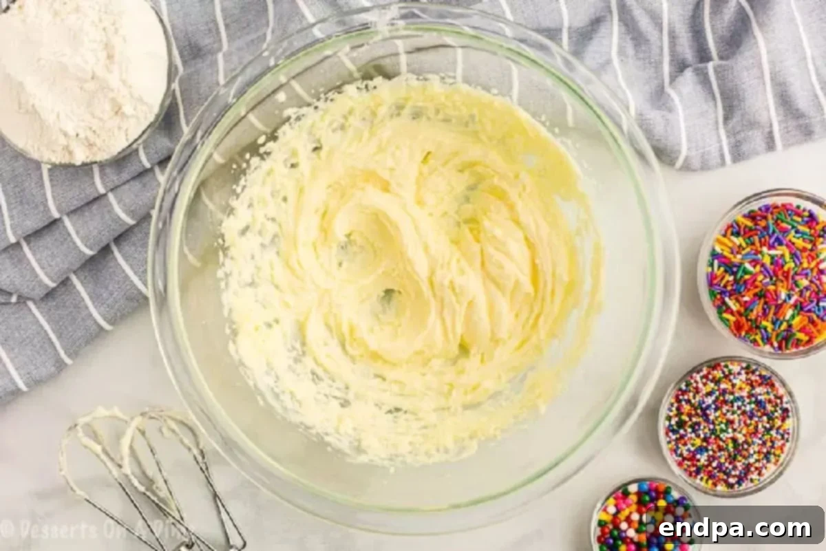 Effortless 3 Ingredient Sugar Cookies 3 Butter and sugar combined in a bowl.