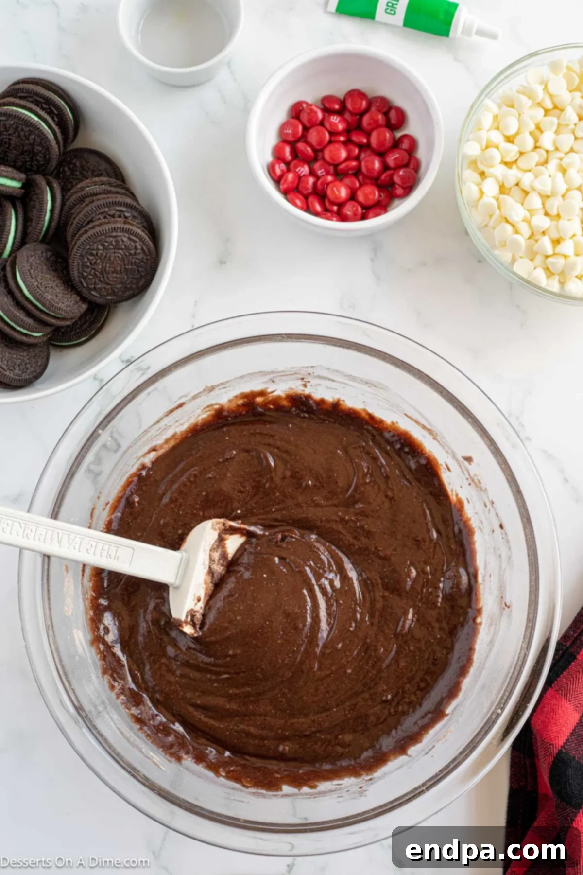 Grinch Green Brownies 4 Brownie batter in a large mixing bowl, ready to be poured into a pan.