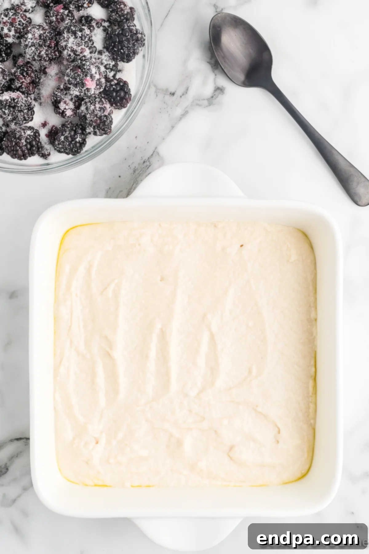 Batter spread into baking dish. 