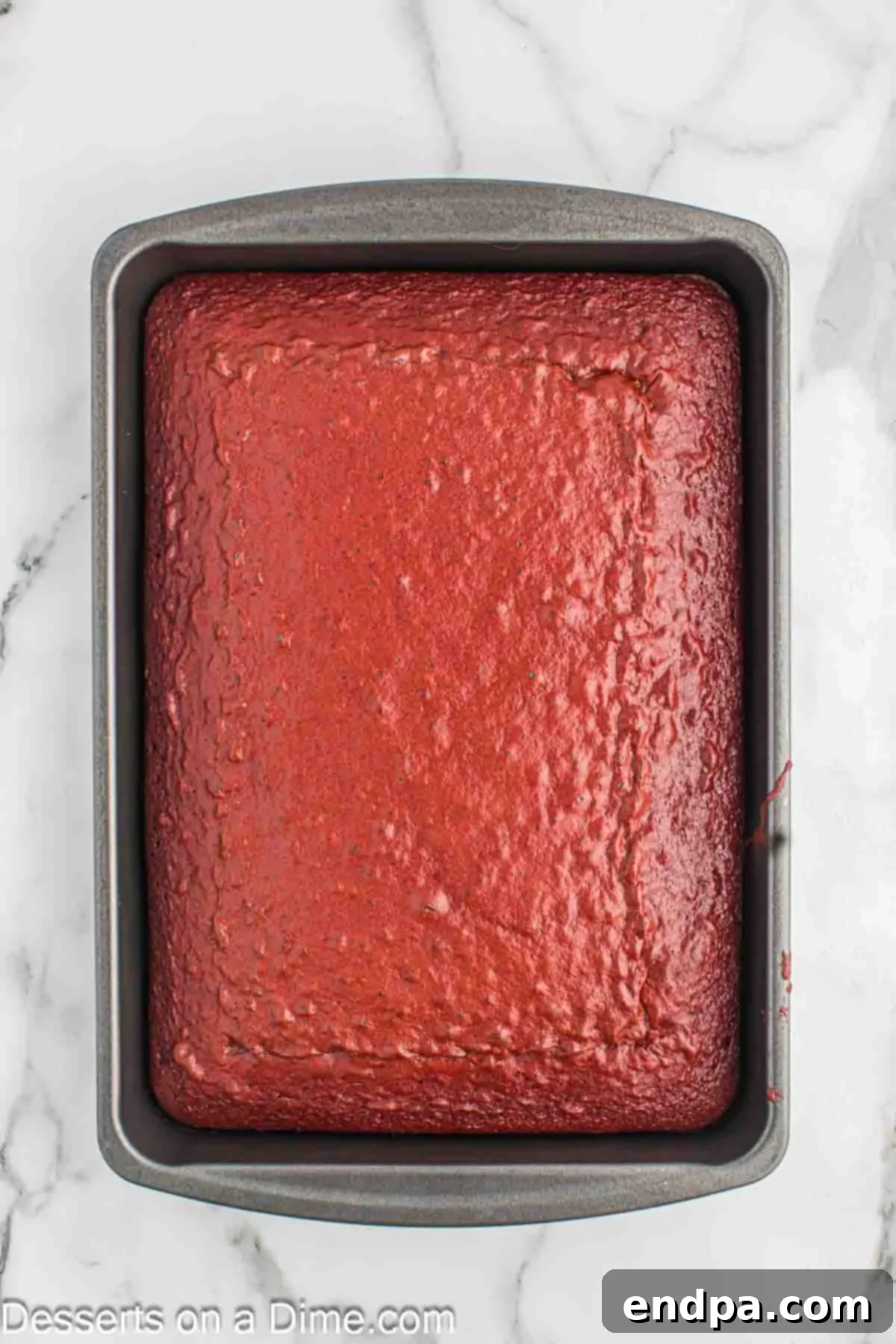 Grinchmas Cake Pops 4 A freshly baked red velvet cake, ready to be transformed into festive Grinch Cake Pops.