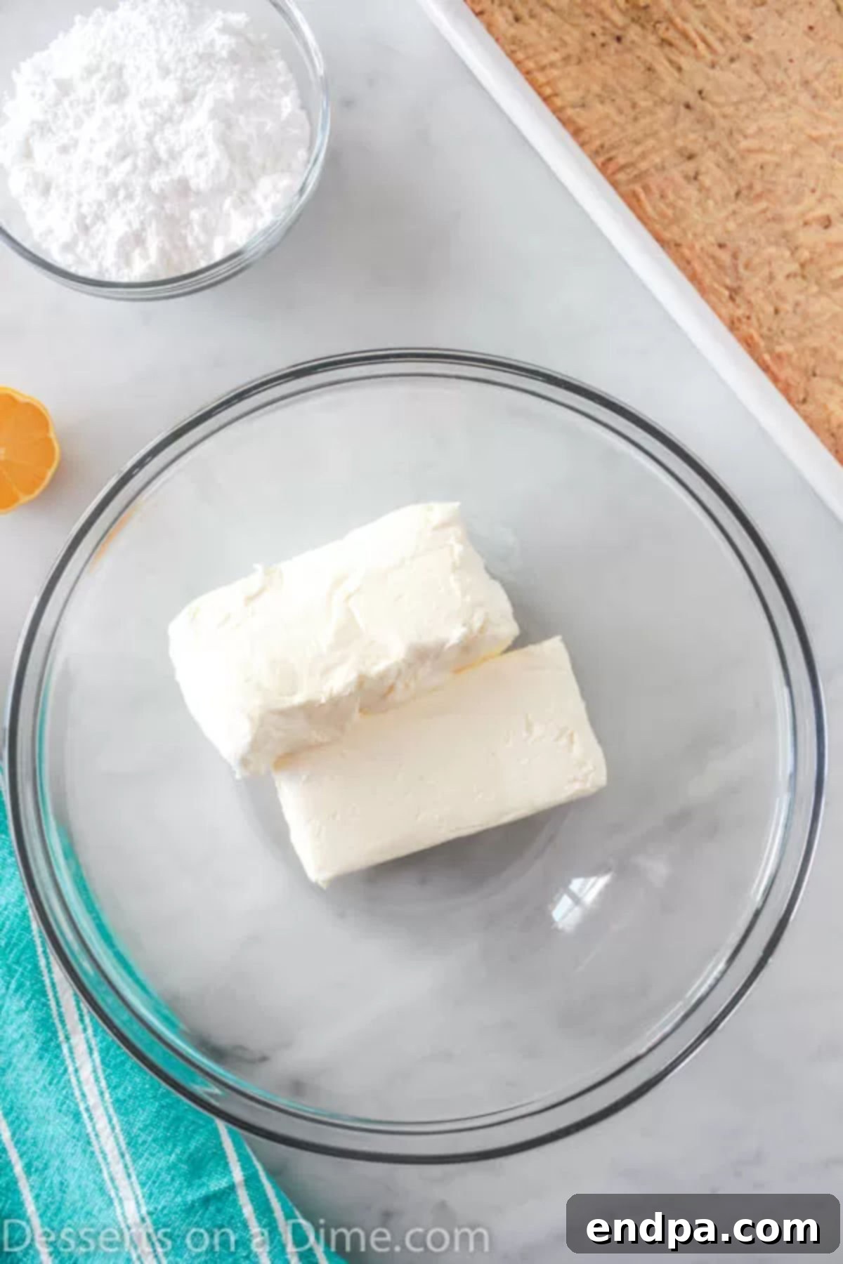 Cream cheese in a mixing bowl, ready to be combined with other ingredients.