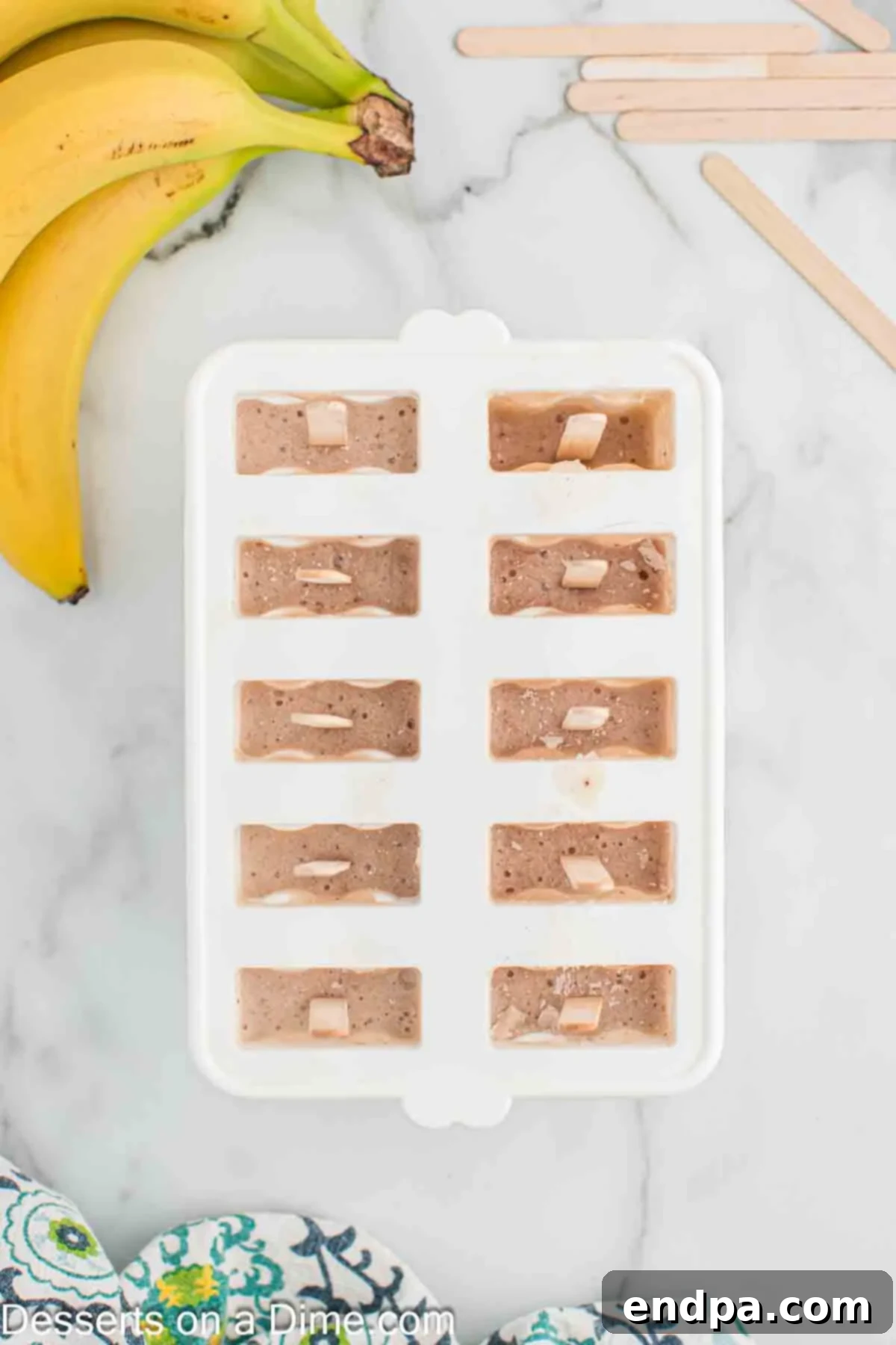 Frozen Banana Delights 7 Popsicles frozen and ready to enjoy.