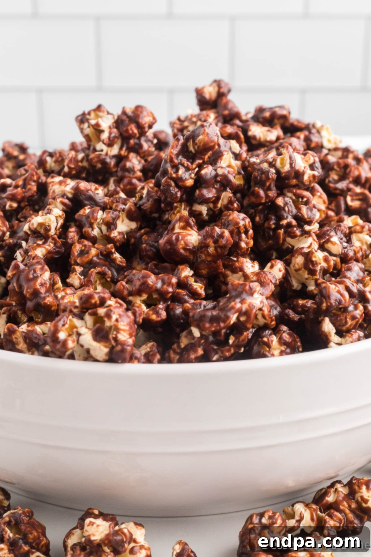 Decadent Chocolate Popcorn 2 Chocolate popcorn in a bowl, ready to be enjoyed.