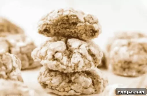 Pumpkin cake mix cookies with powdered sugar.