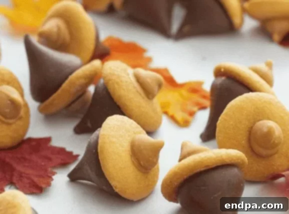 Small, sweet candy acorns made from cookies and chocolate, ideal for fall decor.