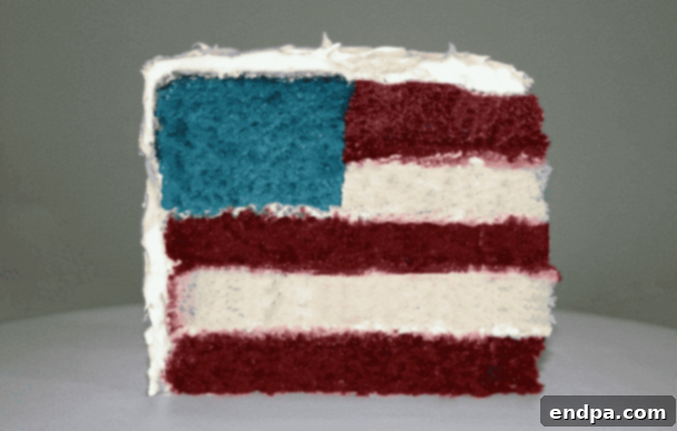 Red White and Blue Cake Masterpieces 9 A festive 4th of July Flag Cake adorned with red, white, and blue decorations.