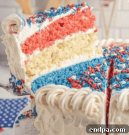 Red White and Blue Cake Masterpieces 11 A tall Patriotic Layer Cake displaying distinct red, white, and blue layers.