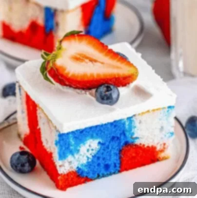 Red White and Blue Cake Masterpieces 16 A colorful Tie-Dye 4th of July Cake, showing swirling red, white, and blue patterns.