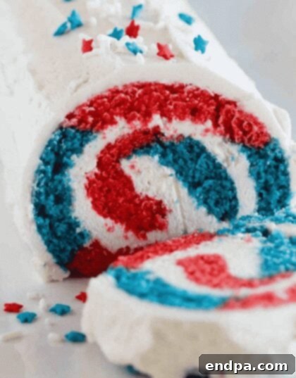 Red White and Blue Cake Masterpieces 17 A festive 4th of July Cake Roll, showcasing a red, white, and blue swirled interior.