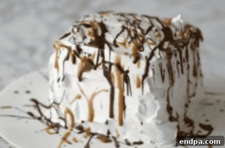 Red White and Blue Cake Masterpieces 18 A refreshing slice of Easy Ice Cream Cake, perfect for summer.