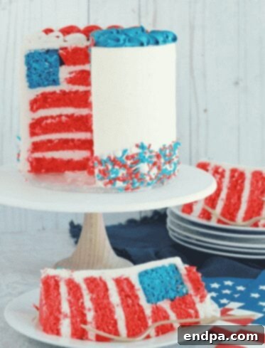 Red White and Blue Cake Masterpieces 7 A striking Flag Cake, intricately designed to resemble the American flag when sliced.