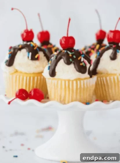 33 Scrumptious Ice Cream Treats 26 Ice Cream cupcakes on a platter.