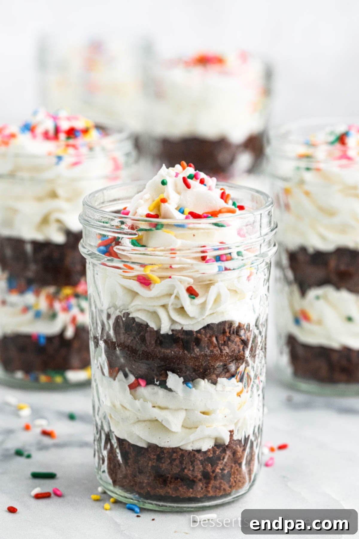 Portable Cupcake Perfection 2 Beautifully layered cupcake in a jar, ready to be enjoyed with a spoon.