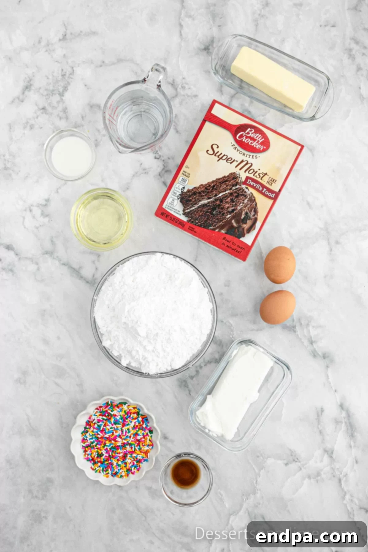 Portable Cupcake Perfection 3 Key ingredients laid out for Cupcake in a Jar: cake mix, shortening, butter, powdered sugar, and vibrant sprinkles.