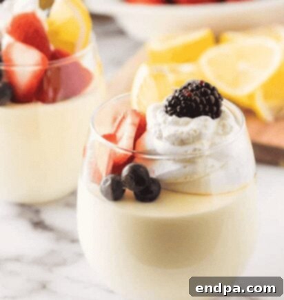 Velvety smooth Lemon Cheesecake Mousse, a light and refreshing no-bake dessert.
