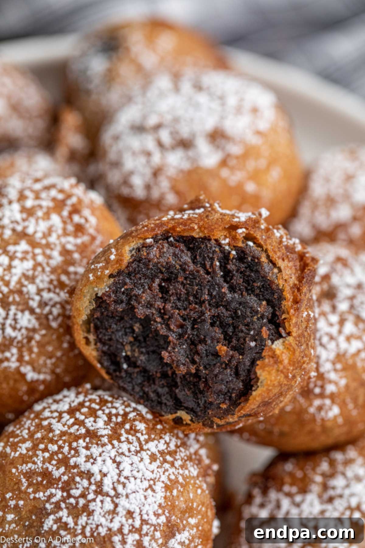 Deep fried Brownie bites with powdered sugar. 