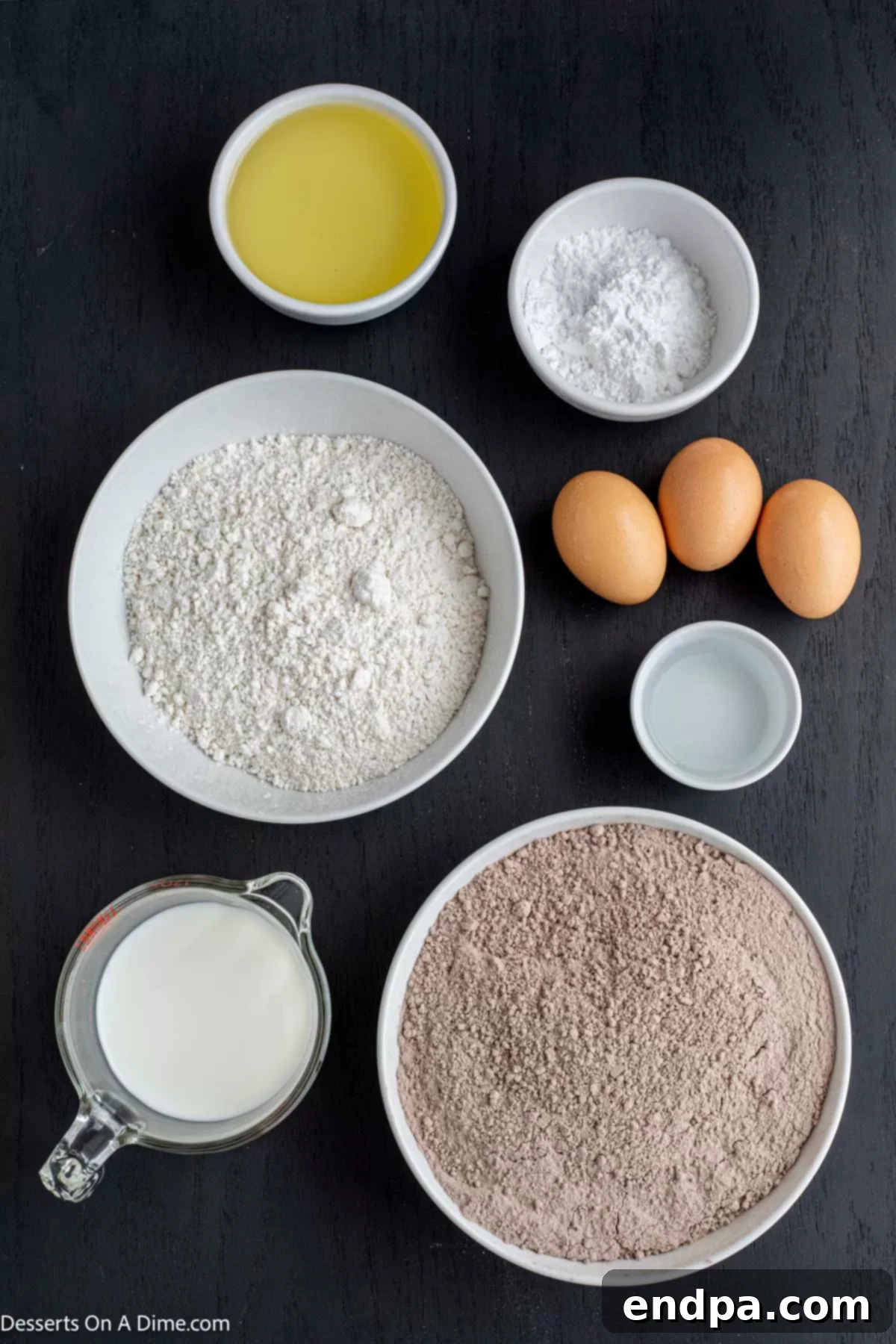 Ingredients for recipe - brownie mix, vegetable oil, powdered sugar, pancake mix, eggs, milk. 