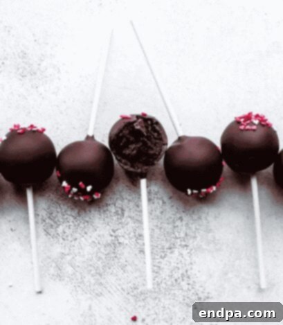 Crafting Irresistible Cake Pops 5 Rich Chocolate Cake Pops, adorned with sweet heart sprinkles for a lovely touch.