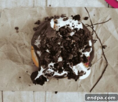 Heavenly Hash Donuts topped with chocolate, marshmallows, and pecans.