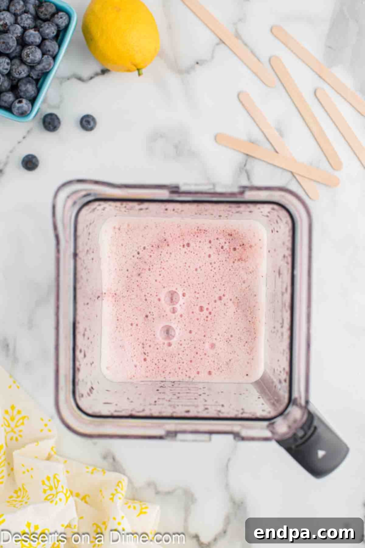 Blender with mixture inside. 