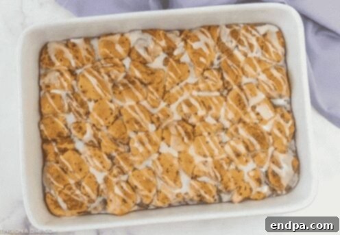 Cinnamon roll french toast casserole with icing.