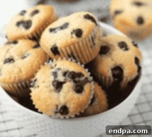 Homemade Blueberry Muffins on a cooling rack.