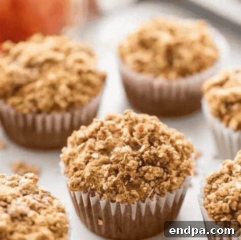 Oatmeal Applesauce Muffins on a cooling rack.