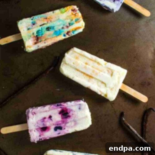 Homemade creamy vanilla popsicles, showcasing their smooth texture.