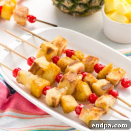 Pineapple Upside Down Cake made campfire style, featuring grilled pineapple and cake.