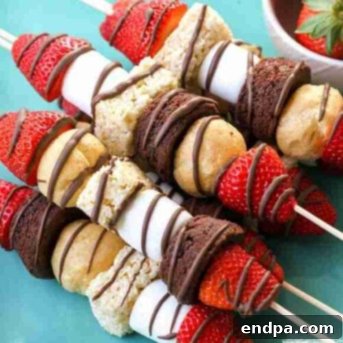 Sweet Success Treats 5 Colorful dessert kabobs featuring fruit, brownies, and marshmallows.