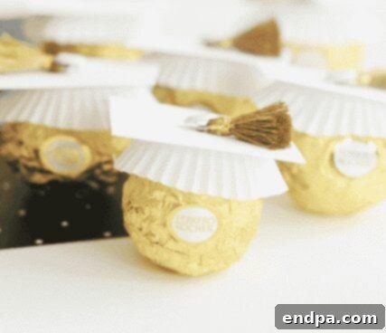Sweet Success Treats 11 DIY Ferrero Rocher graduation treats decorated with mini graduation caps.