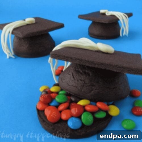 Sweet Success Treats 13 3D chocolate graduation cap cookies filled with colorful candies.