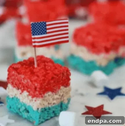 4th of July Rice Krispie Treats with red, white, and blue layers.