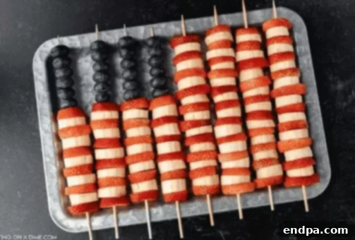 4th of July Fruit Kabobs with blueberries, strawberries, and bananas.