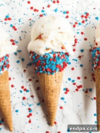 4th of July Ice Cream Cones with sprinkle-dipped edges.