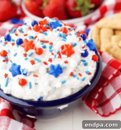 Red, White, and Blue Cake Batter Dip with sprinkles.
