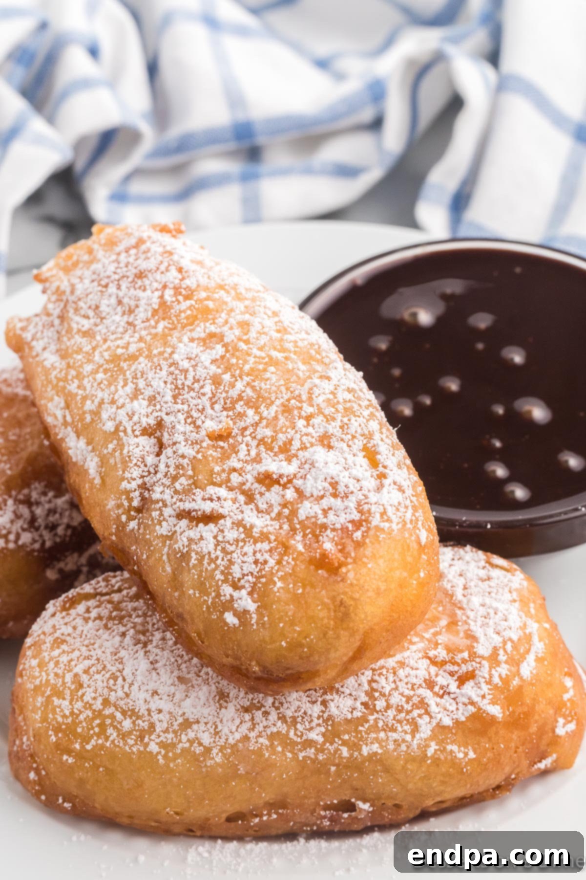Golden Gooey Goodness 2 Deep fried twinkies with dipping sauce.