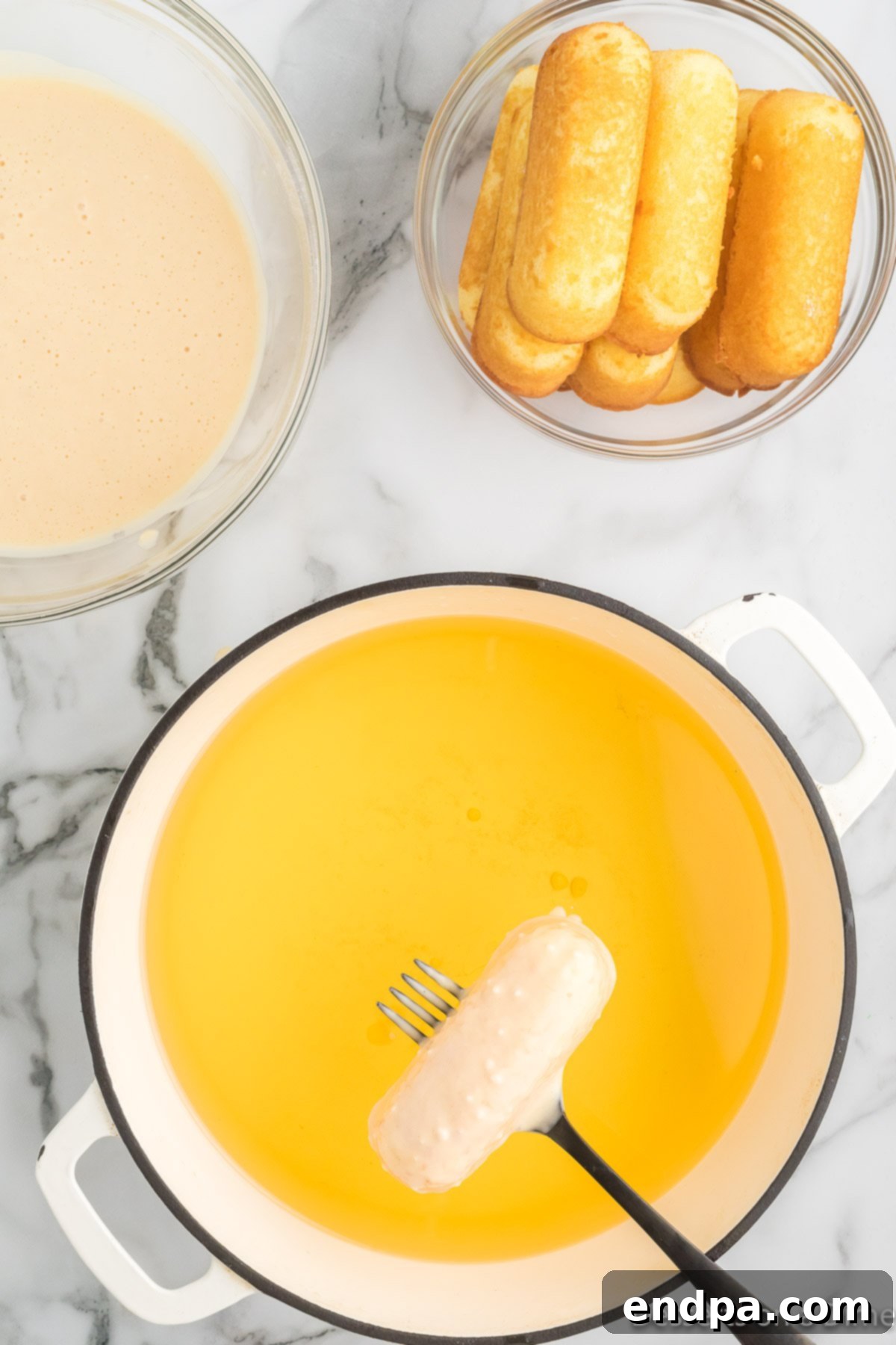 Golden Gooey Goodness 6 Twinkie dipped in oil.