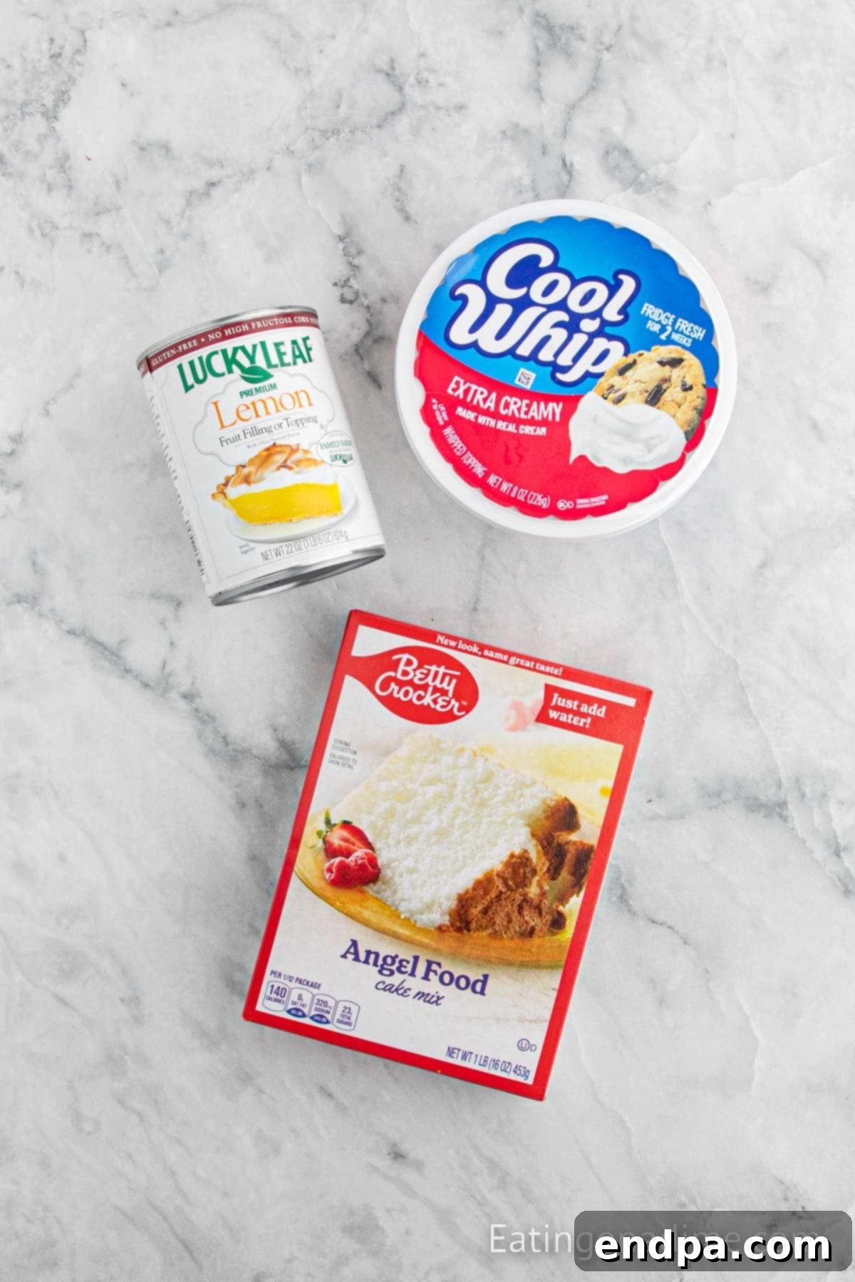 Sunshine Lemon Angel Delight 3 Ingredients for lemon angel food cake. - angel food cake mix, lemon pie filling, whipped topping.