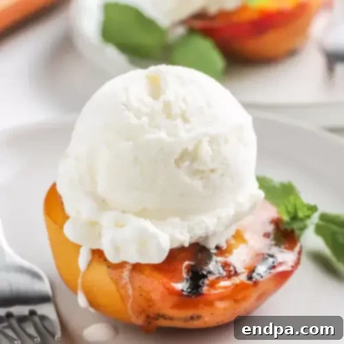 51 Effortless Summer Sweet Treats 3 Slices of grilled peaches arranged on a white plate with a drizzle of honey.