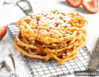 Fried Sourdough Discard Funnel Cakes, a fun way to use excess sourdough starter.