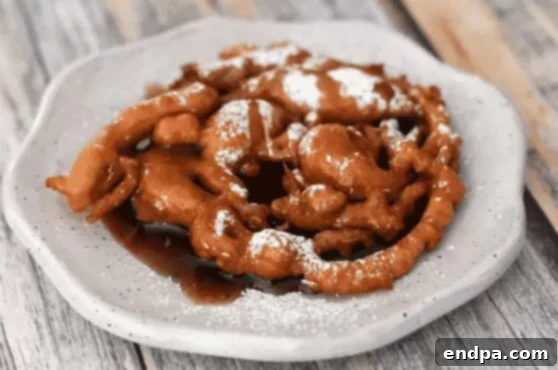 Flavorful Brown Sugar and Cinnamon Funnel Cakes, simple to mix and fry.