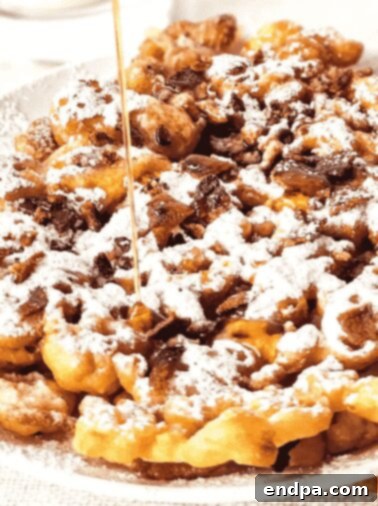Easy homemade Gluten-Free Funnel Cake, satisfying and versatile with toppings.