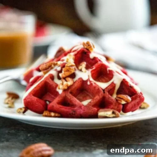 29 Irresistible Red Velvet Desserts 4 Fluffy red velvet waffles, generously topped with a rich cream cheese glaze and chopped pecans.