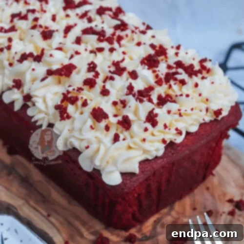29 Irresistible Red Velvet Desserts 12 A moist and flavorful Red Velvet Loaf Cake, beautifully topped with creamy white cream cheese frosting.