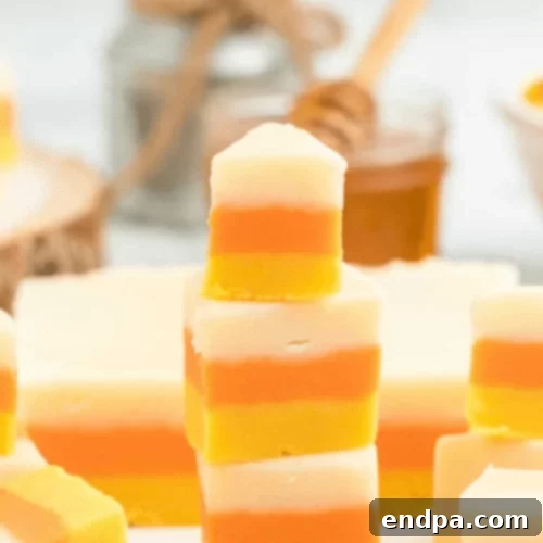 Candy Corn fudge cut into squares.