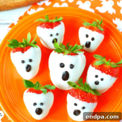 Strawberry ghosts on a plate.